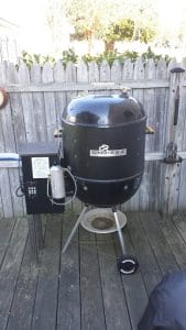Barrel-style custom pellet smoker, a uniquely crafted smoking apparatus designed for flavor enthusiasts