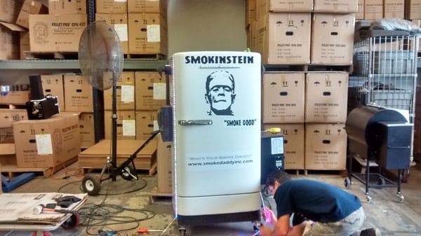 Crafting a custom refrigerator smoker, showcasing the transformation from fridge to smoking masterpiece.
