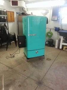 Repurposed Refrigerator Smoker – Crafted for Flavor