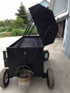 Barrel-style custom pellet smoker, a uniquely crafted smoking apparatus designed for flavor enthusiasts