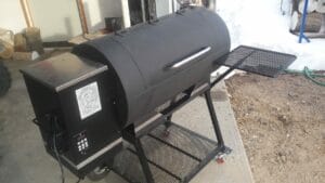 Barrel-style custom pellet smoker, a uniquely crafted smoking apparatus designed for flavor enthusiasts