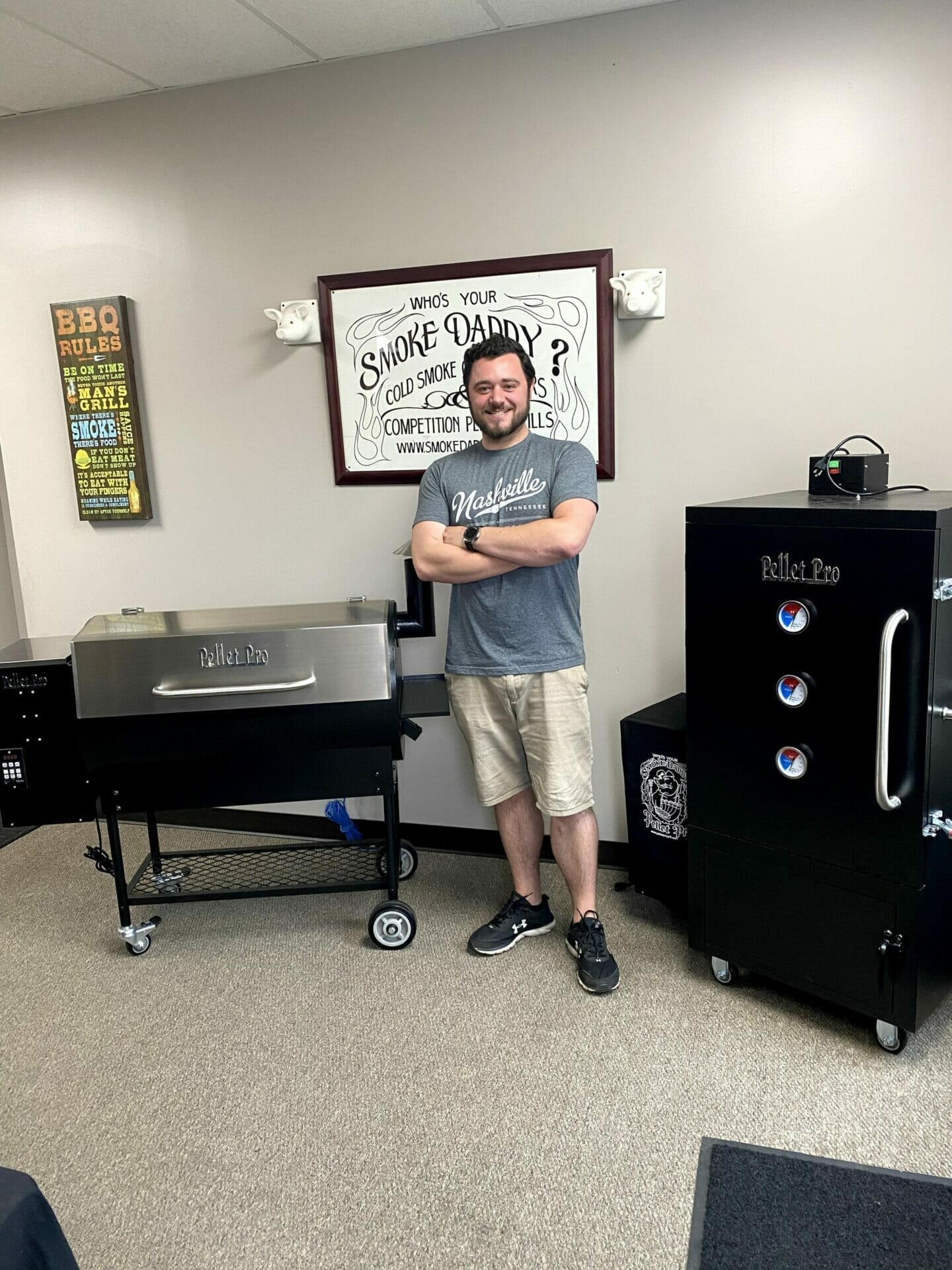 Dan Posing in Showroom Between Two Smokers